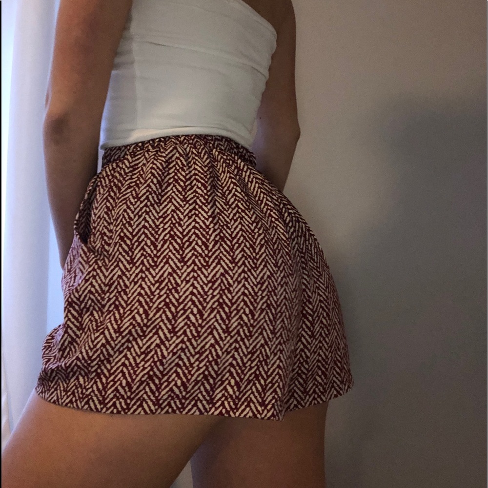 Red and white patterned flowy shorts